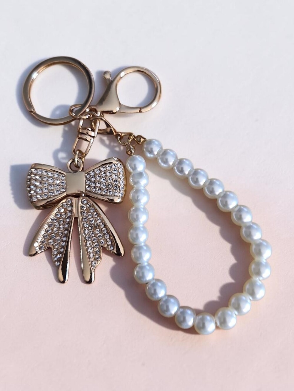 S.B NWT Gold Bow & Pearl Bead Keychain Wristlet.